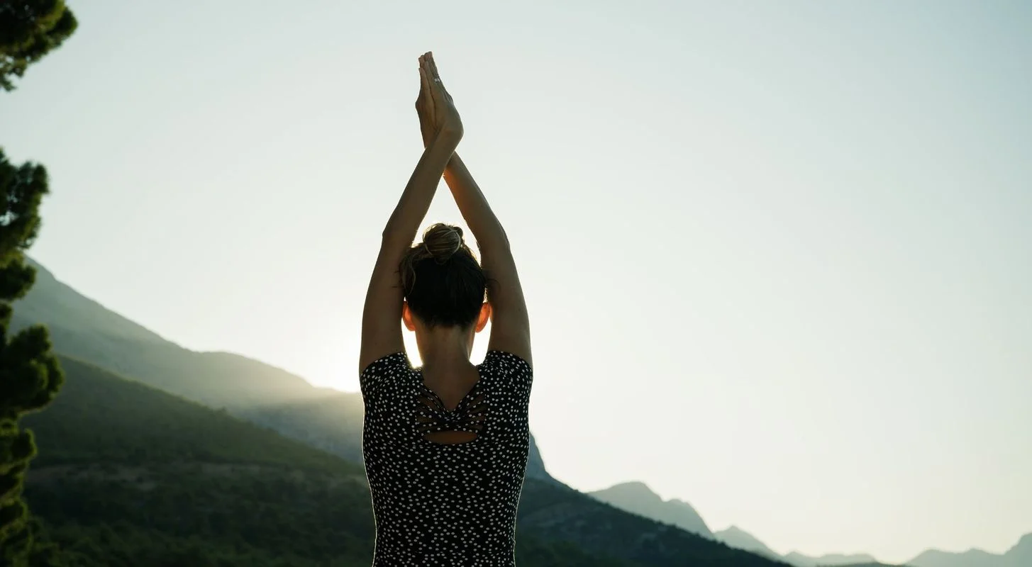 Chiropractor assessing a patient's range of motion