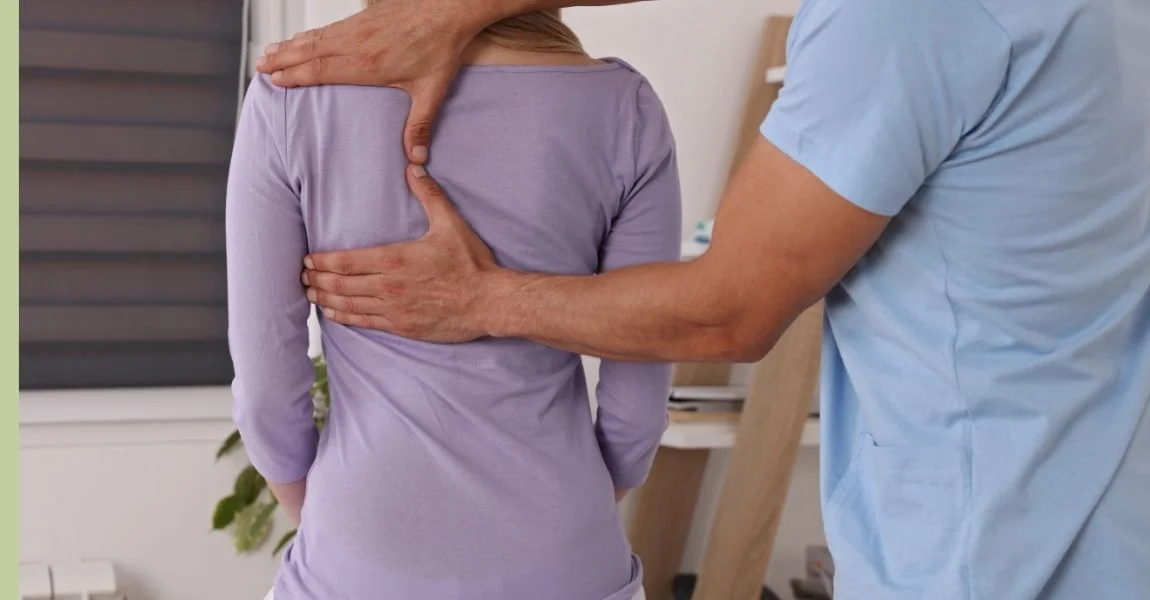 Dr. Hirschi treating a patient at Muscle Works Chiropractic